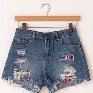 Harper size 28 ripped jean shorts with cute, embroidered flower patches.